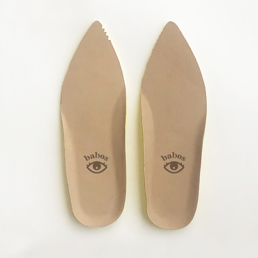 Restorative footbed insoles featuring Babos signature eye logo.